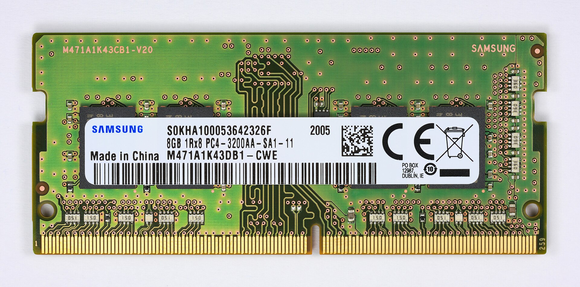 Close view of a laptop RAM stick whose white label reads 8GB 1Rx8 PC4-3200AA